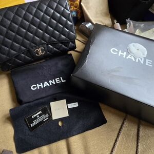 Chanel Maxi Classic Caviar Leather Double Flap